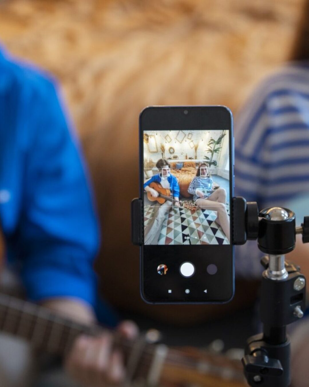 teenage-boy-girl-recording-music-their-home-studio-with-guitar